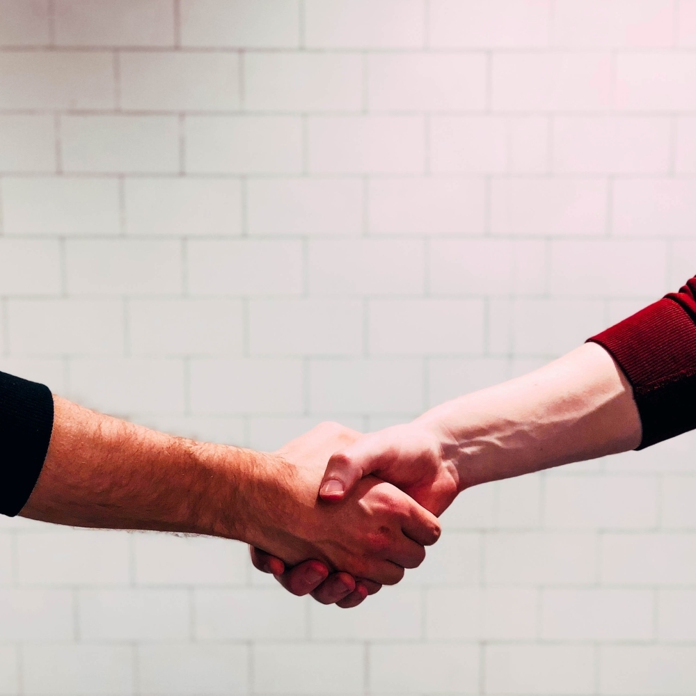 insurance claims specialists handshake