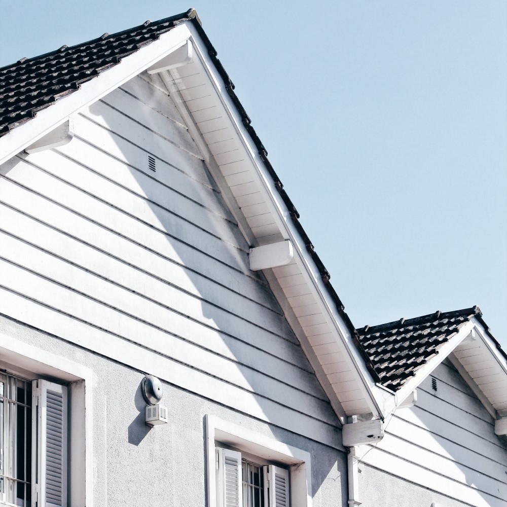 White homes with roofing